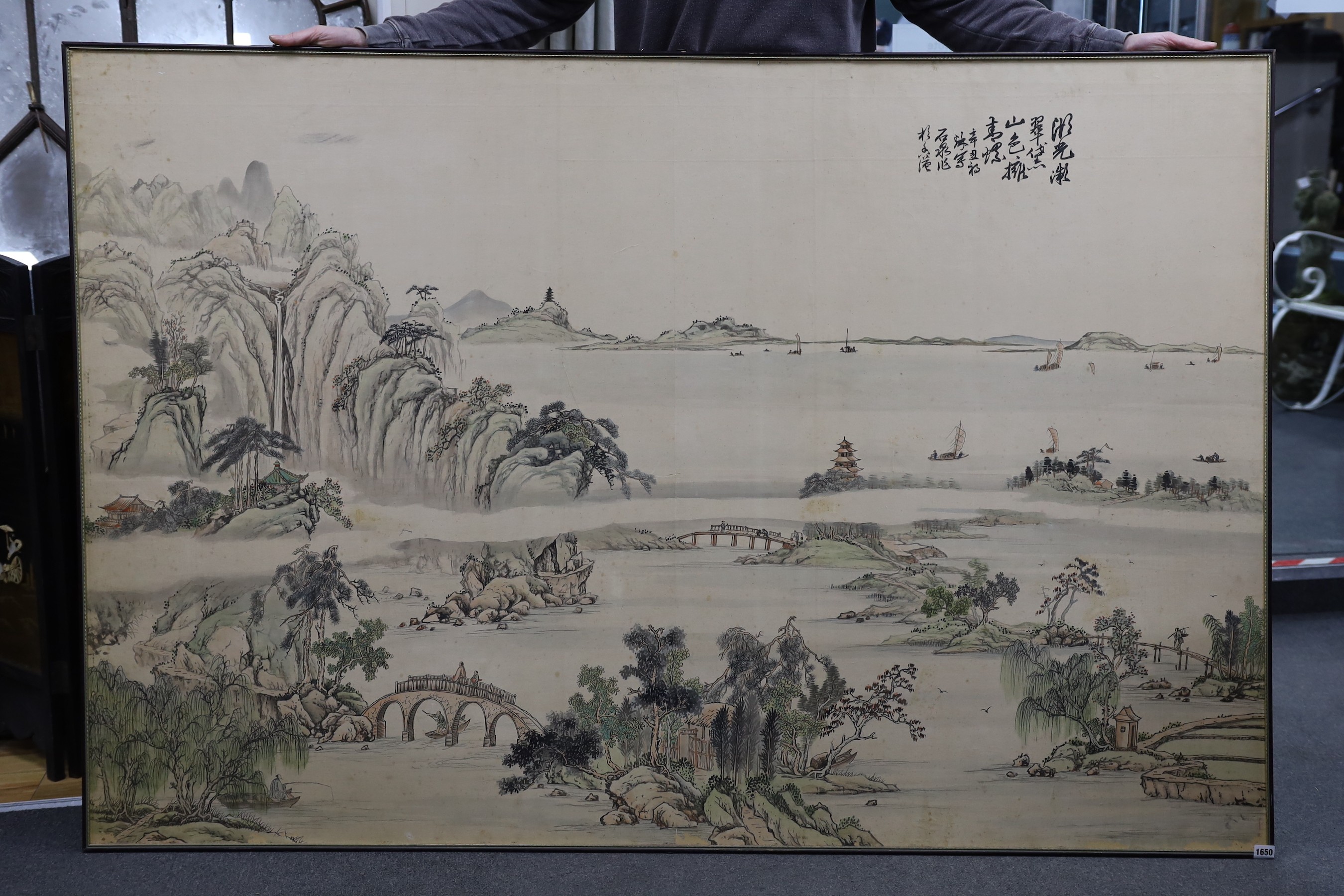 A large Chinese painted silk landscape, signed, 121x181cm